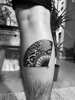 Get a stunning illustrative Japanese fan tattoo done by talented artist, Claudia Vicente, capturing the beauty of traditional Japanese artistry.