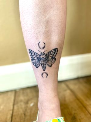Unique dotwork illustration by Charlotte Pokes, featuring a mystical moon and a delicate moth design.