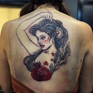 Capture the beauty of love with this stunning neo-traditional tattoo by artist Holly Valley. Features a detailed portrait of a woman intertwined with a heart motif.