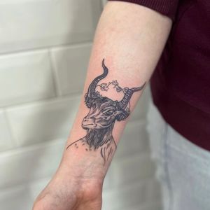 Get inked with a stunning illustrative goat design reminiscent of woodcut and etching techniques by the talented artist Holly Valley.