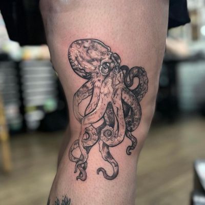Get inked by the talented Holly Valley with a unique octopus design that will leave you in awe. Perfect for ocean lovers!