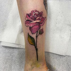 Get a beautifully detailed neo traditional rose tattoo by the talented artist Holly Valley. Perfect for those who love floral designs!