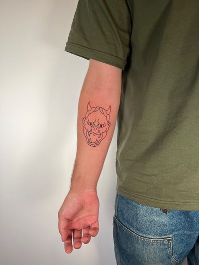 Get a unique hannya tattoo with fine lines and illustrative style by the talented artist Dave Norman. Express your inner demon in a minimalistic way.