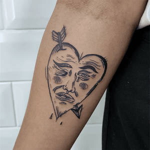 Express your love with this illustrative heart tattoo by Adam McDade, featuring a unique and edgy style.