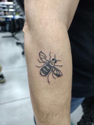Illustrative bee design by talented artist Adam McDade, showcasing his unique ignorant style.