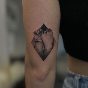 Detailed black and gray dotwork tattoo of hands, expertly done by Dax.tattoos for a unique and intricate design.