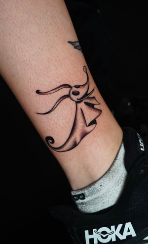 Get an illustrative tattoo of Zero from Nightmare Before Christmas by tattoo artist Miss Vampira. Perfect for fans of the spooky and adorable character.