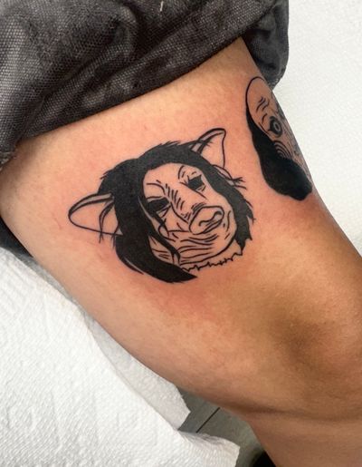 Get a chilling illustrative horror tattoo of a pig face by Miss Vampira for a unique and hauntingly beautiful design.