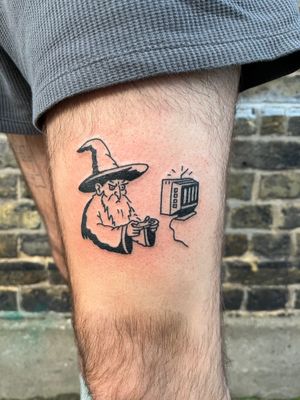 Experience the whimsical world of wizards through a unique blend of video game and TV references in this illustrative and ignorant tattoo by artist Dave Norman.