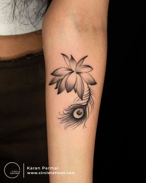 Feather Bloomed out of a Flower Tattoo made by Karan Parmar at Circle Tattoo India