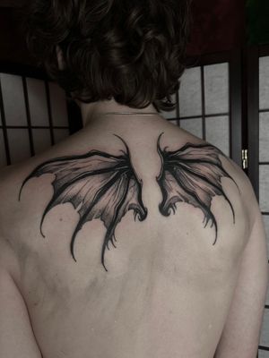 Unique blackwork and dotwork design of bat wings by Dominga Longo. A mystic and powerful symbol for your body art.