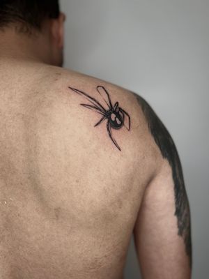 Get a stunning illustrative spider tattoo by Dominga Longo, perfect for lovers of blackwork style!