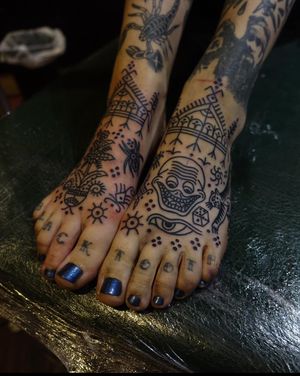 Adorn your skin with a stunning ornamental pattern tattoo created with precision by the talented artist, Treubhan.