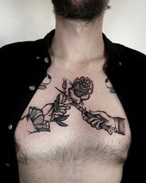 Beautiful black and gray tattoo by Ludo Matmut, featuring an intricate design of a rose and dagger.