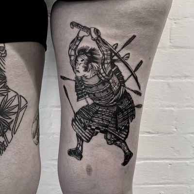 Embrace the warrior spirit with this stunning Japanese samurai tattoo by renowned artist Ludo Matmut. Intricate details and bold lines bring this traditional motif to life.