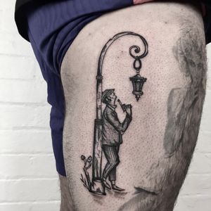 Unique dotwork, illustrative, and traditional tattoo featuring a street lamp and man, by talented artist Ludo Matmut.