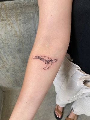 Get a unique and intricate turtle tattoo in fine line style by talented artist Charlie Macarthur. Dive into the world of illustrative art!