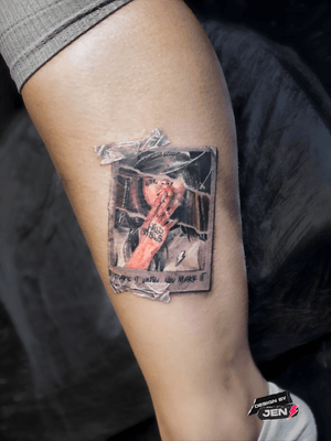 polaroid picture and rip effect color tattoo