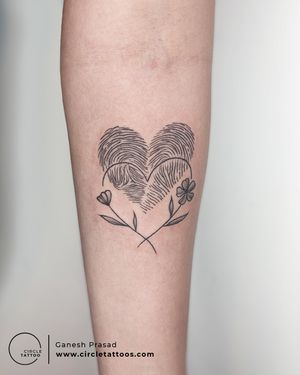 Finger Print Heart with Flower Tattoo made by Ganesh Prasad at Circle Tattoo Bangalore
