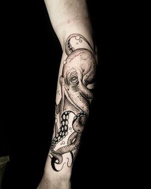Get mesmerized by Ben Twentyman's detailed dotwork illustration of an octopus, a true masterpiece for your skin.