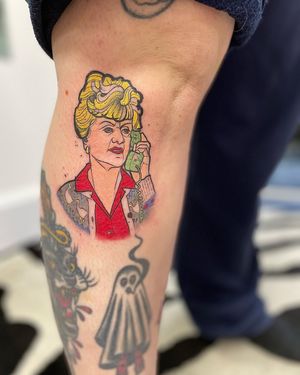 Get a nostalgic touch with this vibrant and detailed neo-traditional tattoo of Mrs. Doubtfire, brought to life by artist Hannah Keuls.