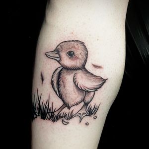 Adorn your skin with a beautiful illustrative tattoo of a duck and duckling, expertly done by Ben Twentyman.