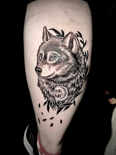 Capture the mystique of the moon and the strength of the wolf with this beautiful tattoo by artist Ben Twentyman.