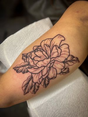 Elegant floral design featuring a vibrant hibiscus flower, expertly created by the talented artist Jack Howard.