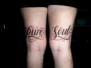 Experience the beauty of simplicity with this elegant lettering tattoo featuring the quote 'Pure Soul' by renowned artist Ben Twentyman.