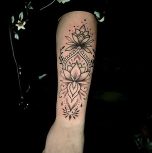 Intricate dotwork design by Ben Twentyman, featuring a beautiful combination of lotus and mandala motifs.