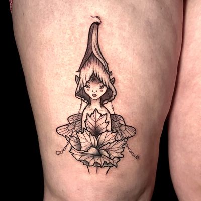 Explore the mystical world of nature with this intricate dotwork tattoo by Ben Twentyman. Featuring a whimsical fairy resting on a delicate leaf.