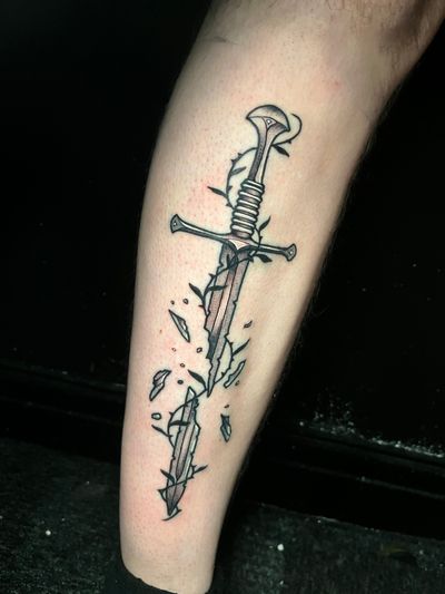 Illustrative dotwork tattoo of Narsil sword from Lord of the Rings, by artist Ben Twentyman