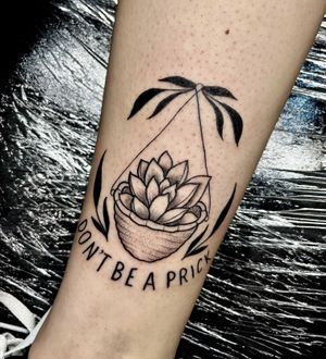 Unique dotwork illustrative tattoo by Ben Twentyman featuring a plant in a vase with the message 'don't be a prick'.