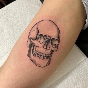 Get a unique and intricate dotwork illustration of a skull by the talented artist Jack Howard. Stand out with this amazing tattoo!