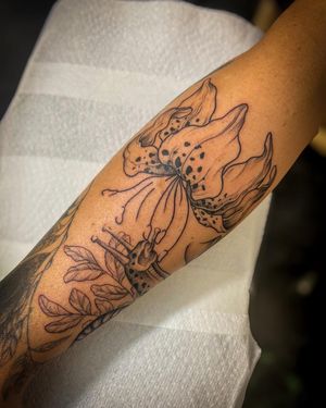 A stunning dotwork design by Jack Howard featuring a beautiful flower and a charming snail illustration.