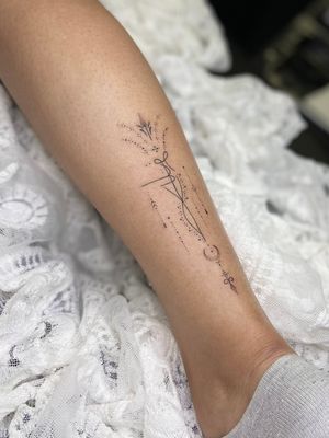 Get a dainty and intricate tattoo design with dotwork and fine line techniques executed by the talented artist Viví Bogdanov.