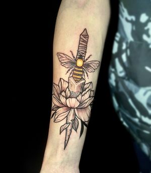 Intricate dotwork design featuring a bee, flower, lotus, dagger, and knife, expertly crafted by tattoo artist Ben Twentyman.
