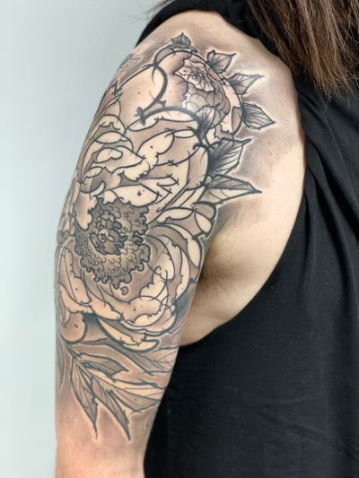 Unique and detailed illustrative tattoo featuring a sketch-style chrysanthemum, expertly executed by tattoo artist Hannah Keuls.