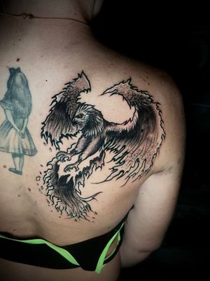A stunning dotwork phoenix tattoo created by the talented artist Ben Twentyman.