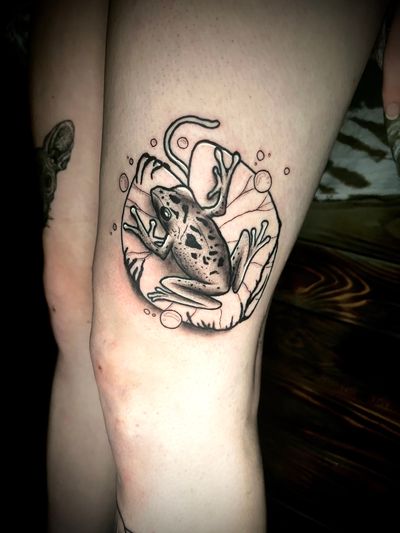 Get a unique black and gray illustrative tattoo of a frog done in dotwork style by the talented artist Ben Twentyman