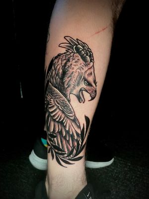 Get inked with a stunning illustrative tattoo of an eagle and harpy by the talented artist Ben Twentyman.