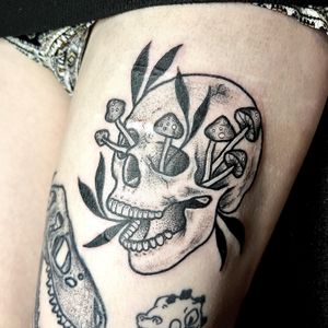 Illustrative design by Ben Twentyman featuring a skull and mushroom in intricate dotwork style