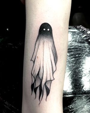 Get inked by Ben Twentyman with a spooky ghost on a unique dotwork sheet design.