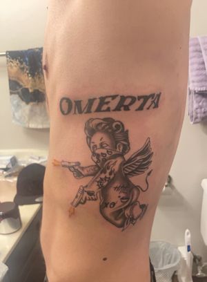 Tattoo #19: Thugged Out Cherub w/Omerta above it. Done by Phil Veil at Omertà Tattoo! 