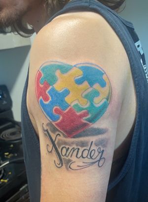 Tattoo #20: Autism Awareness Heart w/my son’s name. Done by Phil Veil