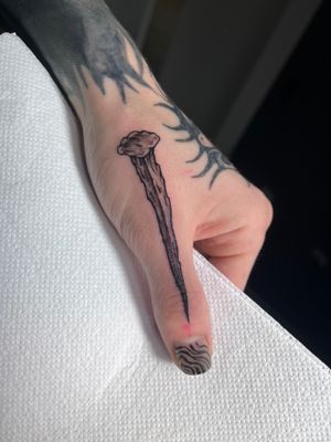 Get a striking stake, pin, or nail tattoo in the unique illustrative style by the talented artist Claudia Whiteheart.