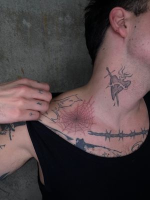 Get tangled in the beauty of this fine line, illustrative spider web tattoo by Rich Sinner.