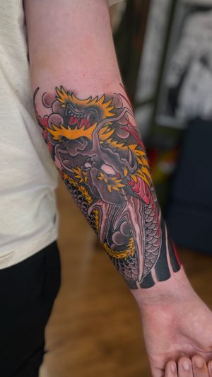 Dragon and cherry blossom wrapping forearm to be extended at a later date