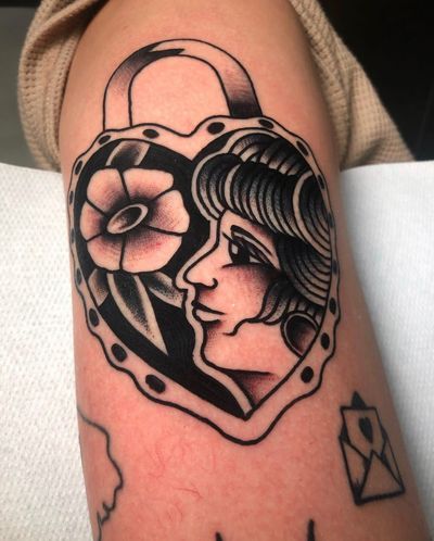 Beautiful traditional tattoo design featuring a flower, heart, padlock, and woman, by renowned artist Angel Face.