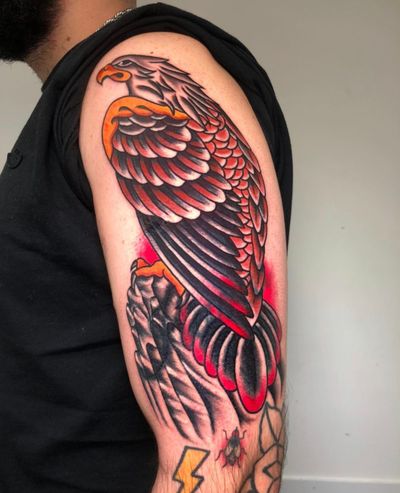 Capture the strength and majesty of the eagle with this traditional tattoo design by Angel Face. Perfect for those seeking a timeless and powerful symbol.